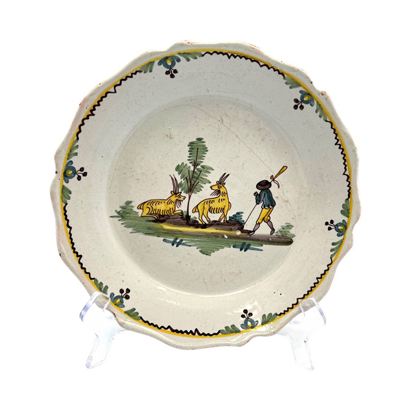 Nevers plate decorated with 2 goats 18th century