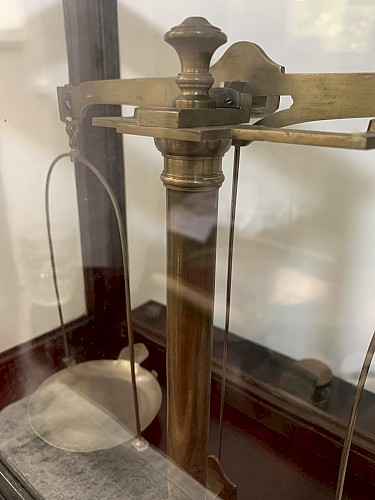 Trebuchet under cage, old pharmacy / laboratory scale