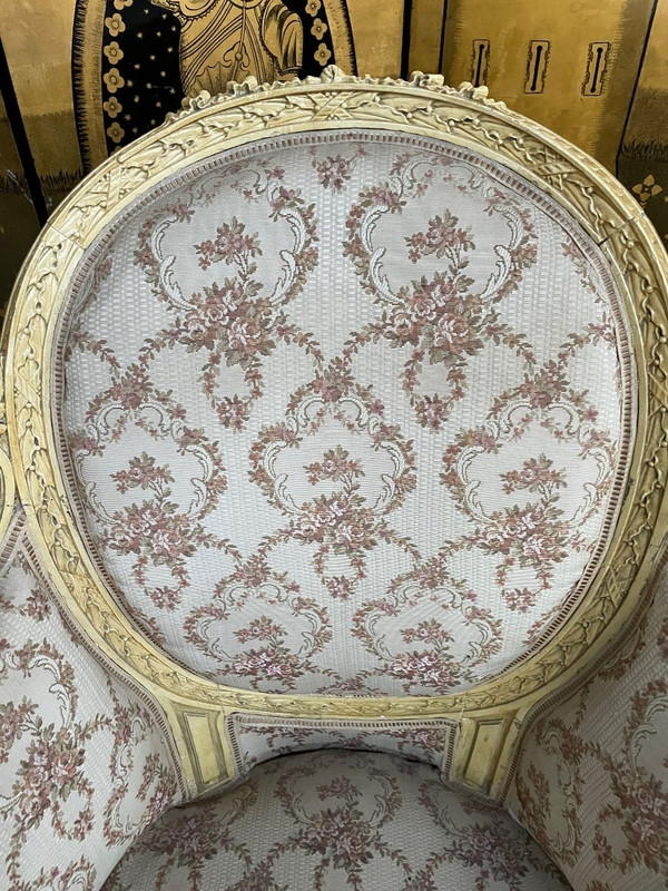 Paire de fauteuils bergères de style Louis XVI