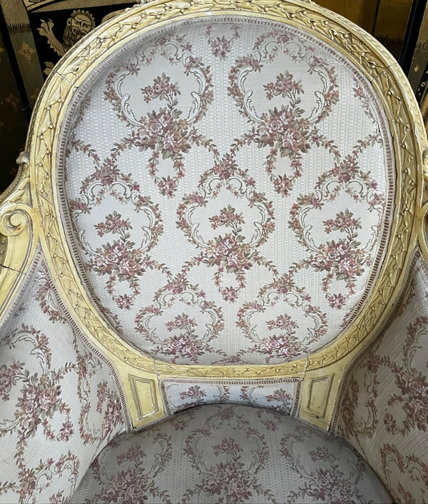 Paire de fauteuils bergères de style Louis XVI