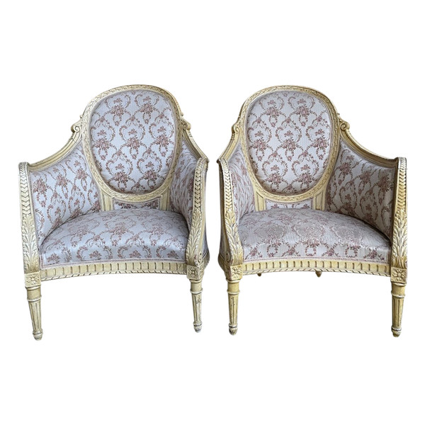 Paire de fauteuils bergères de style Louis XVI