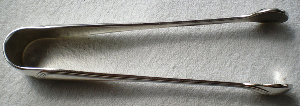 Sugar tongs model "Spatours" in silver metal Christofle goldsmith