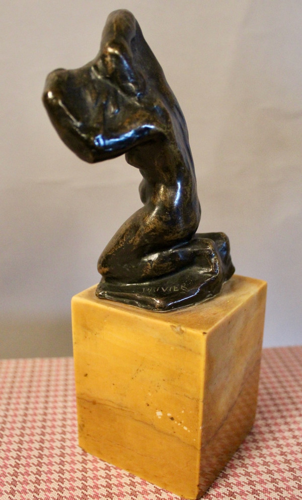 Bronzo di Léon Ernest Drivier "Bagnante che si lega i capelli"
