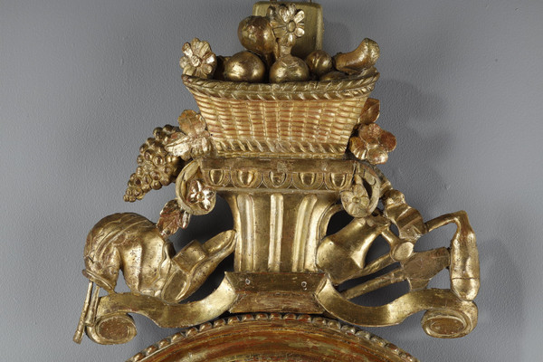Barometer-thermometer in gilt wood, Louis XVI period