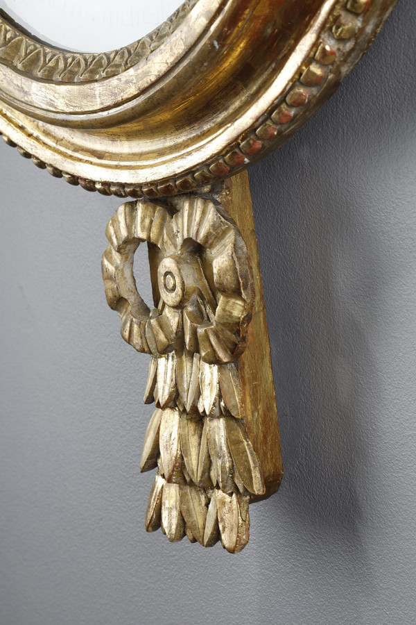 Barometer-thermometer in gilt wood, Louis XVI period