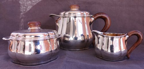 Art deco tea service in solid silver, punch neck brace Goldsmith Fouquet-Lapar
