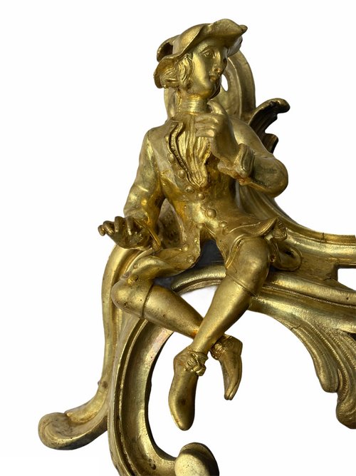 Pair of Louis XV style gilt bronze andirons representing a couple seated on rockery