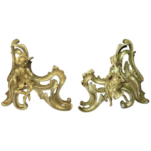 Paire de chenets bronze doré style Louis XV représentant un couple assis sur de la rocaille