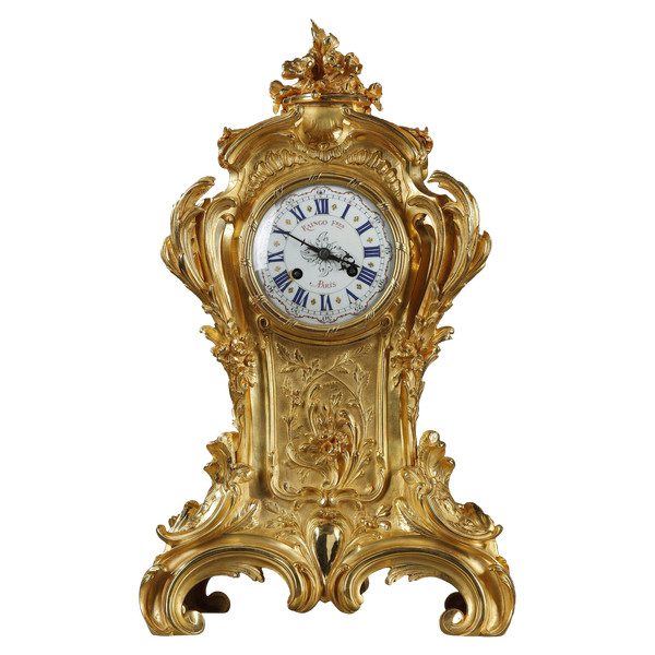 ORMOLU AND CHASED BRONZE ROCAILLE CLOCK, RAINGO AND BROTHERS 