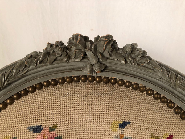 Paire de bergères à oreilles de style Louis XVI en bois laqué gris. Fin XIXe
