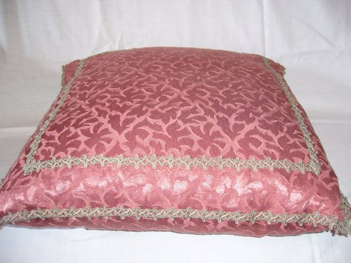 Damask and braid cushion