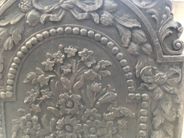 Beautiful old cast iron fireback from the 18th century