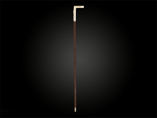 WALKING CANE probably of a woman carved with flowers - European work from the beginning of the 20th century