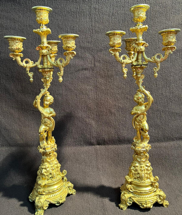 Coppia di candelabri Putti in bronzo dorato, XIX secolo