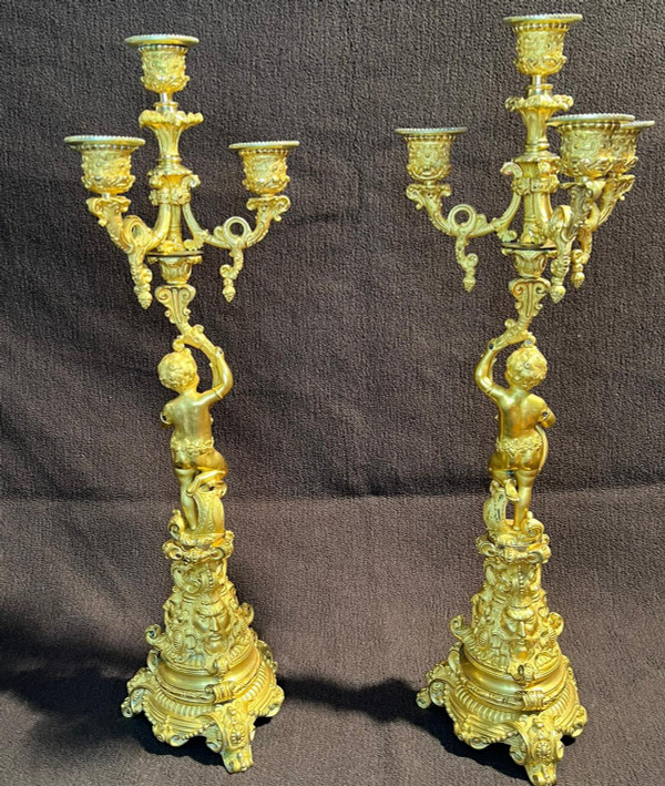 Coppia di candelabri Putti in bronzo dorato, XIX secolo