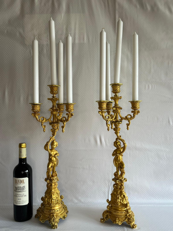 Coppia di candelabri Putti in bronzo dorato, XIX secolo