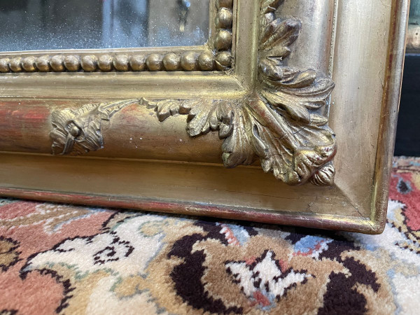 Louis Philippe period mirror in gold leaf
