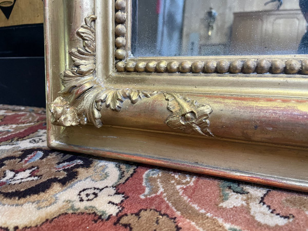 Louis Philippe period mirror in gold leaf