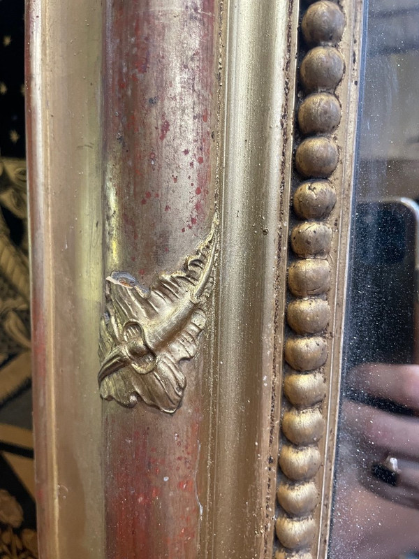 Louis Philippe period mirror in gold leaf