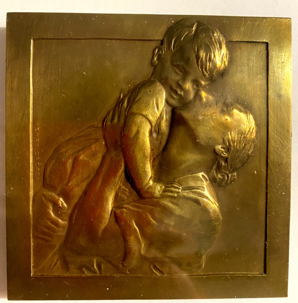 deux médailles en bronze art déco , montées sous verre en pendant dans un beau cadre carré