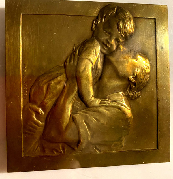 deux médailles en bronze art déco , montées sous verre en pendant dans un beau cadre carré