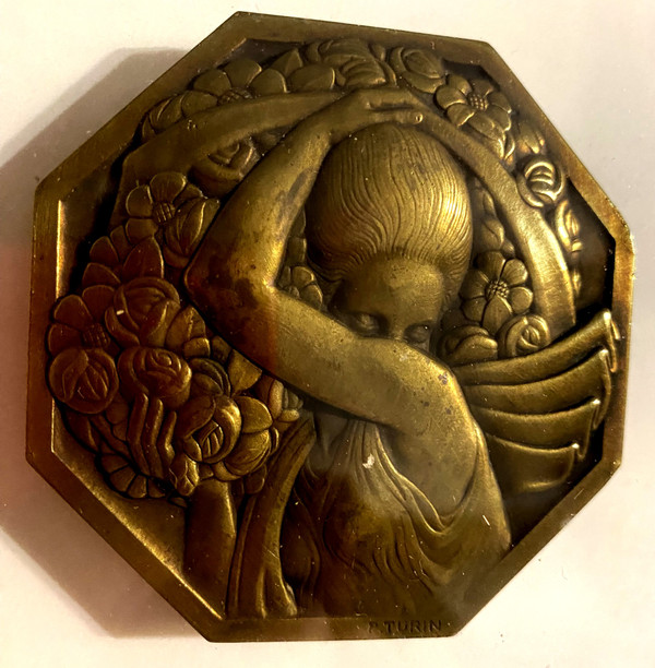 deux médailles en bronze art déco , montées sous verre en pendant dans un beau cadre carré