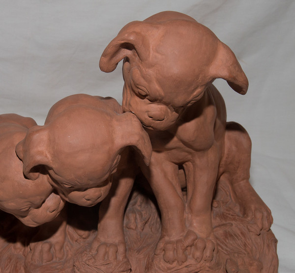 "Tre Cuccioli" in terracotta Firmato Georges Lucien Vacossin Inizio del XX secolo