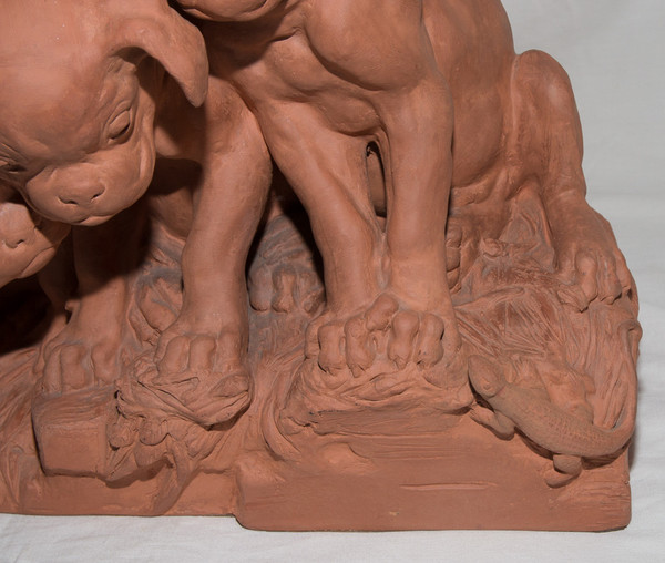 "Tre Cuccioli" in terracotta Firmato Georges Lucien Vacossin Inizio del XX secolo