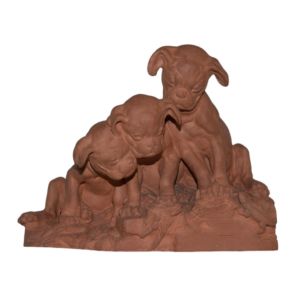 "Tre Cuccioli" in terracotta Firmato Georges Lucien Vacossin Inizio del XX secolo