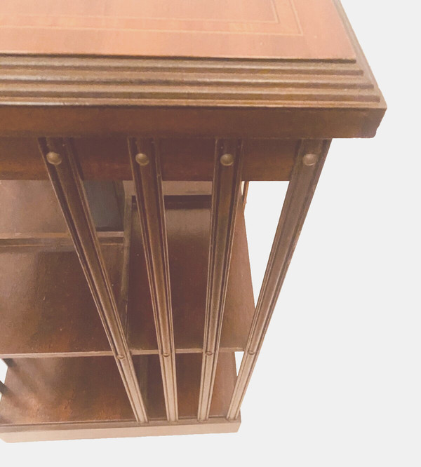 Mahogany revolving bookcase with inlaid top 20th century