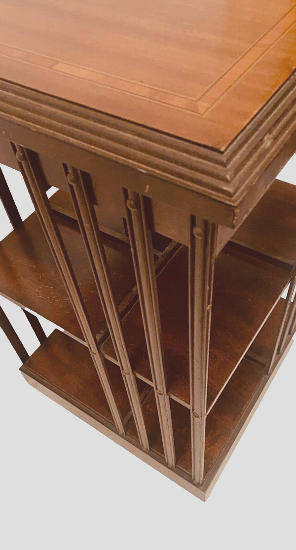 Mahogany revolving bookcase with inlaid top 20th century