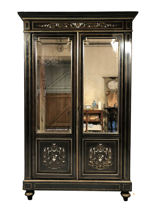 Libreria Napoleone III, legno annerito con intarsi in ottone, avorio e madreperla