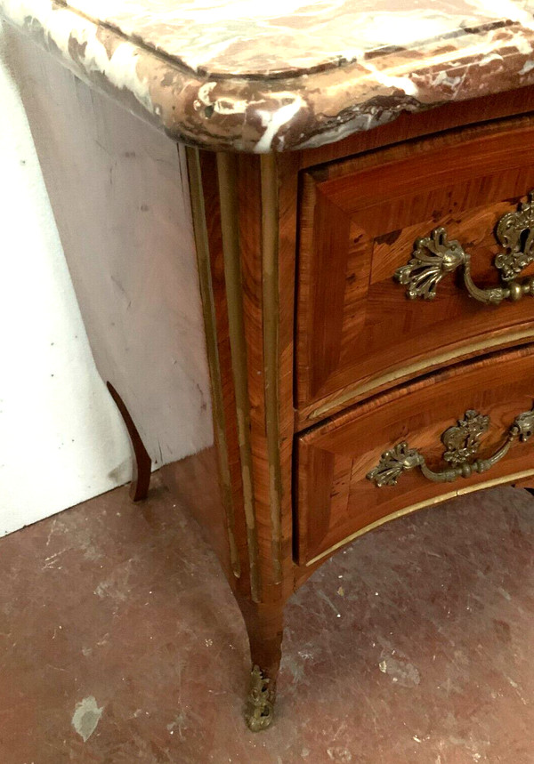 Louis XV saute chest of drawers with curved facade 18th century