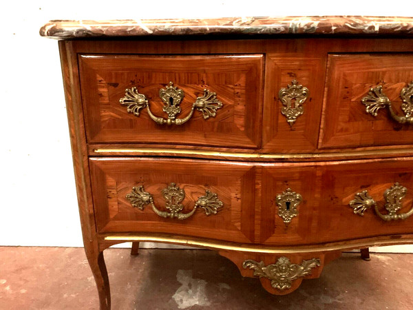 Louis XV saute chest of drawers with curved facade 18th century