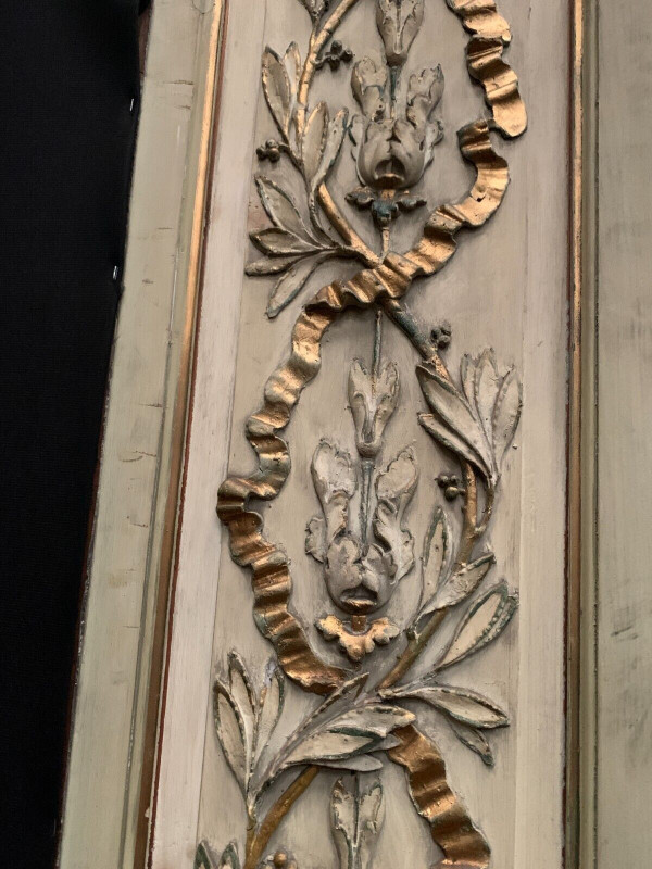 19th century patinated and gilded wood and stucco fireplace mirror