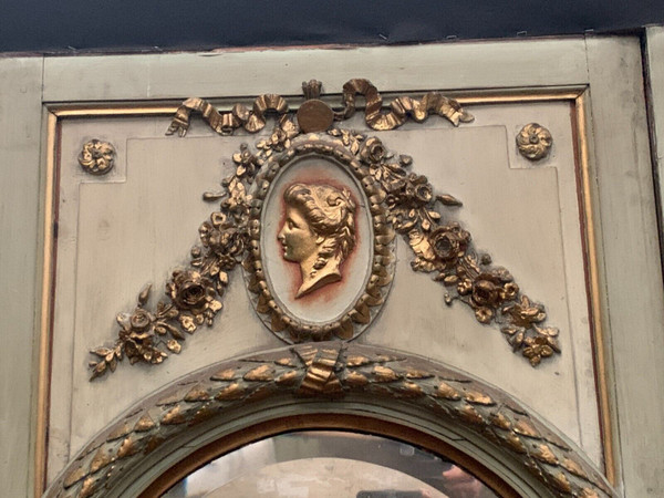 19th century patinated and gilded wood and stucco fireplace mirror