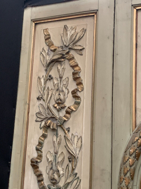 19th century patinated and gilded wood and stucco fireplace mirror