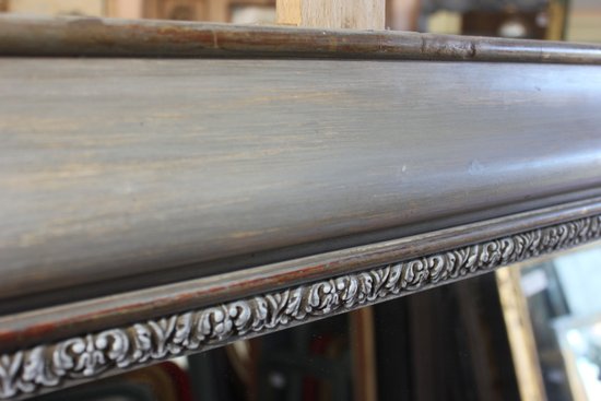 Old fireplace mirror with patina restoration