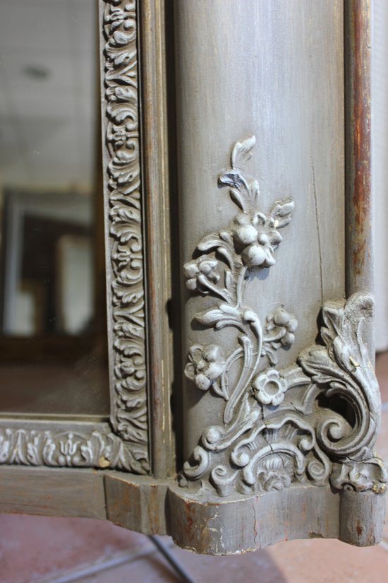 Old fireplace mirror with patina restoration