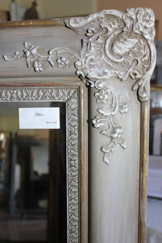 Old fireplace mirror with patina restoration