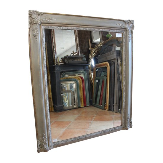 Old fireplace mirror with patina restoration