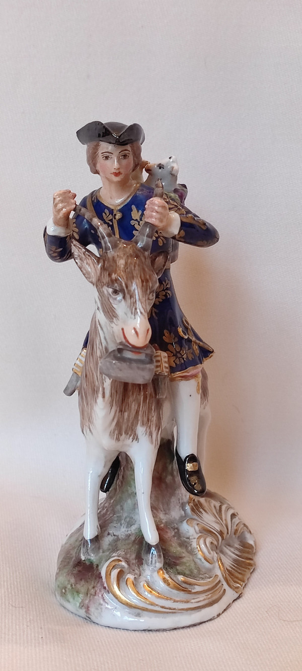 Tailor on a goat.porcelain Samson.Chesea