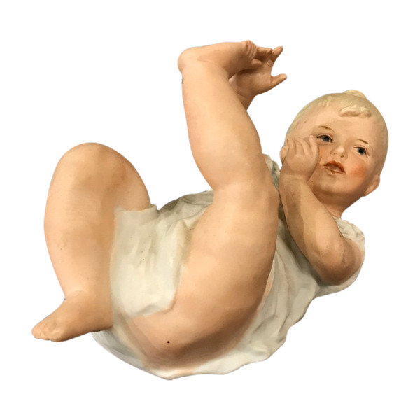 Bébé piano en porcelaine de biscuit vers 1900