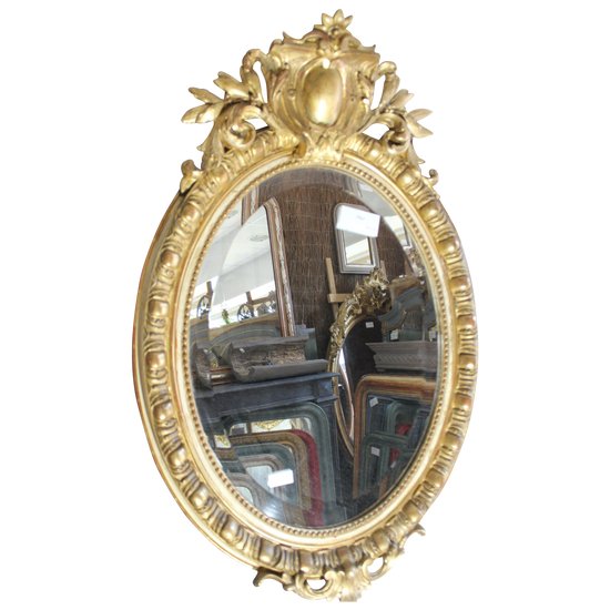 Antique Napoleon III oval mirror in gilded Louis XV style