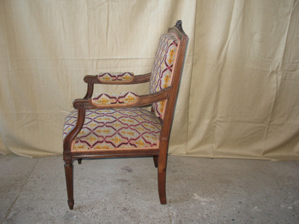 Pair of walnut armchairs with flat backs, 19th century Louis XVI style, stitched trim