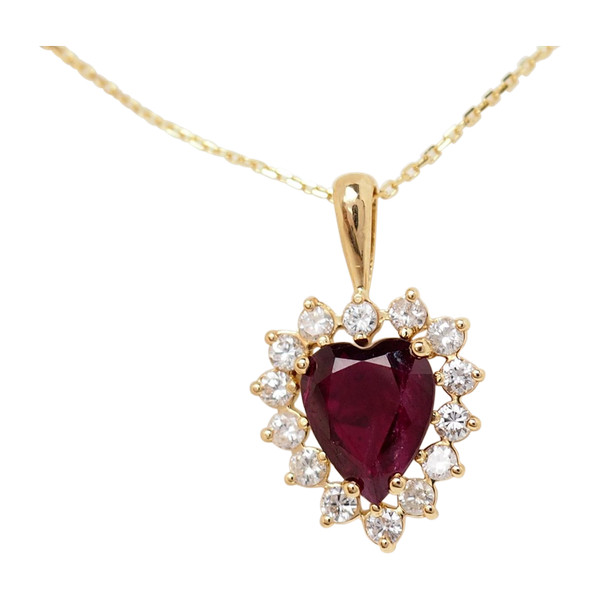 Collier pendentif coeur en or jaune, diamants et rubis