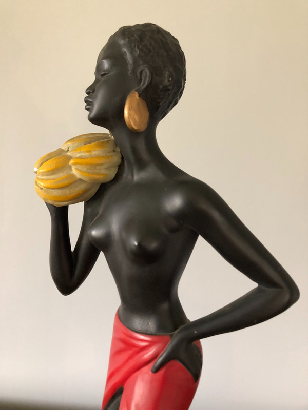Orientalist polychrome plaster statue by Salvatore Melani (1902-1934) The Banana Carrier