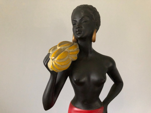 Orientalist polychrome plaster statue by Salvatore Melani (1902-1934) The Banana Carrier