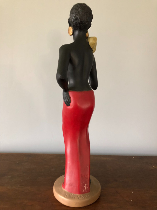 Orientalist polychrome plaster statue by Salvatore Melani (1902-1934) The Banana Carrier