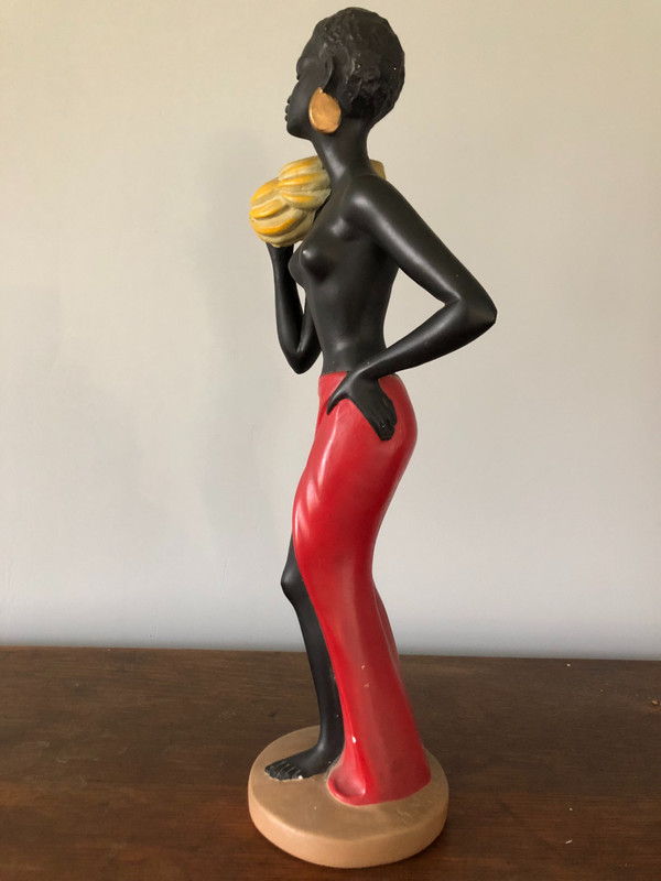 Orientalist polychrome plaster statue by Salvatore Melani (1902-1934) The Banana Carrier